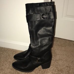 Black boots with buckets.